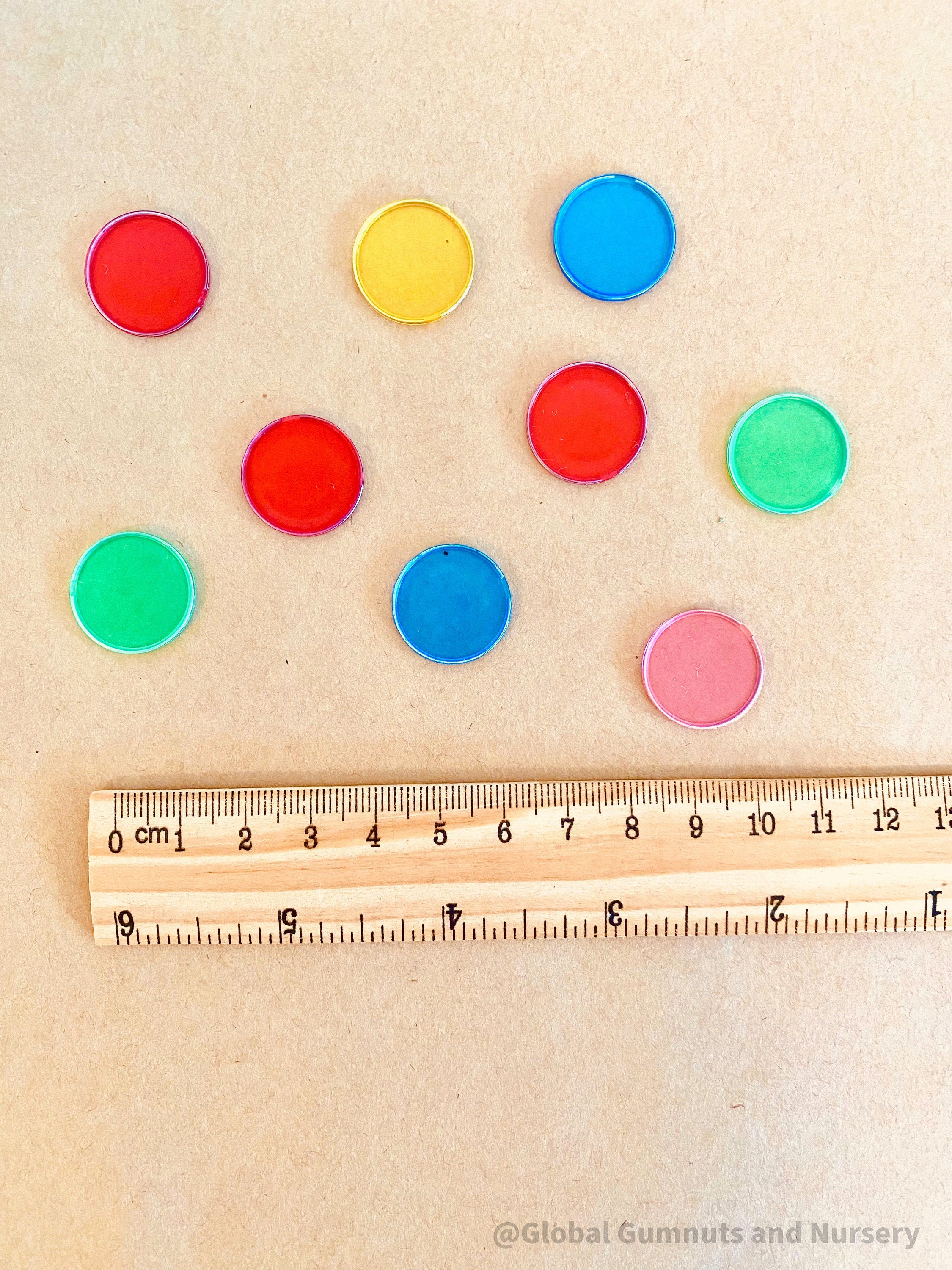 Magnetic colored chips/tiles, a fun and versatile addition to magnetic play or learning activities.