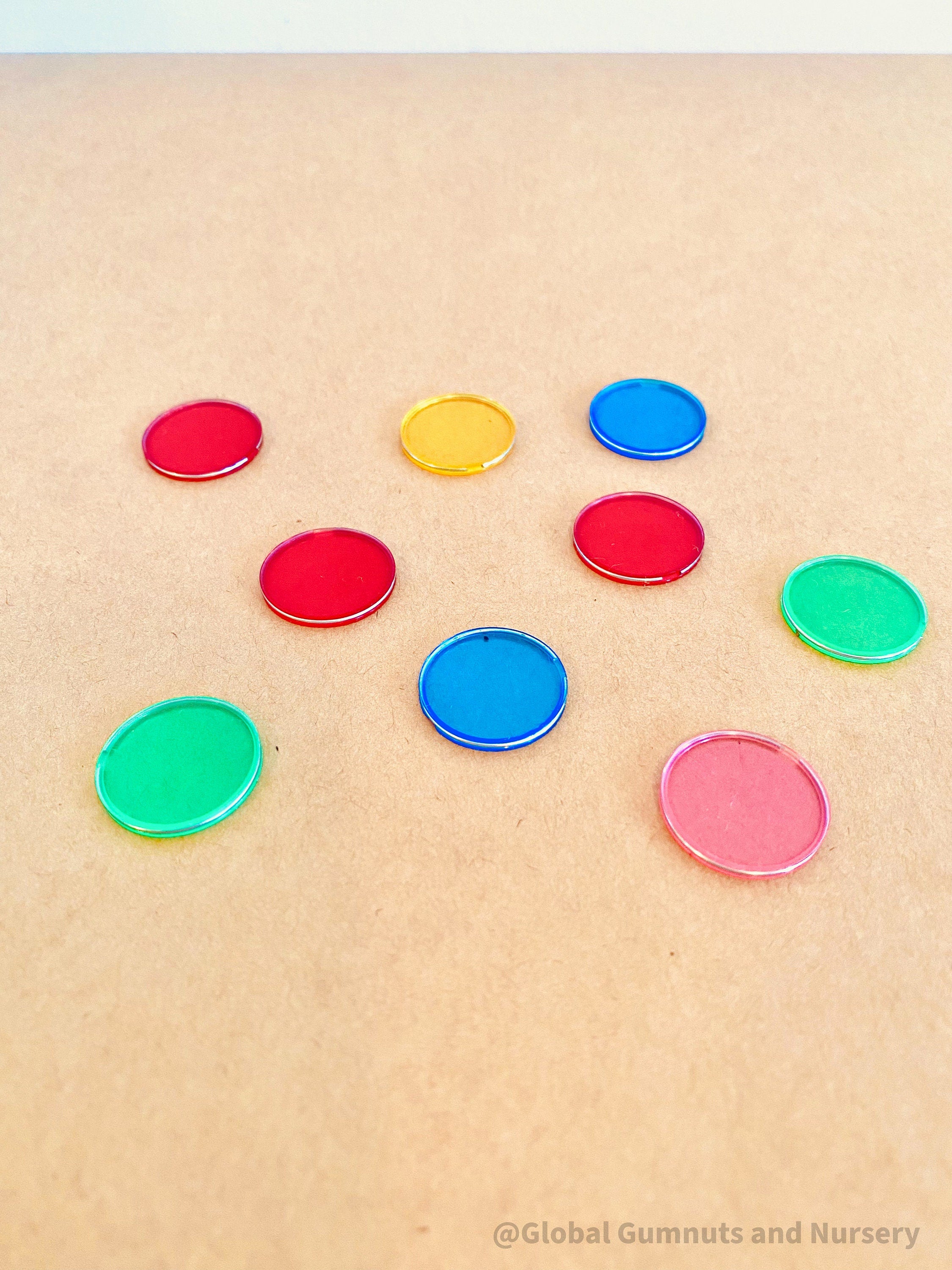 Magnetic colored chips/tiles, a fun and versatile addition to magnetic play or learning activities.
