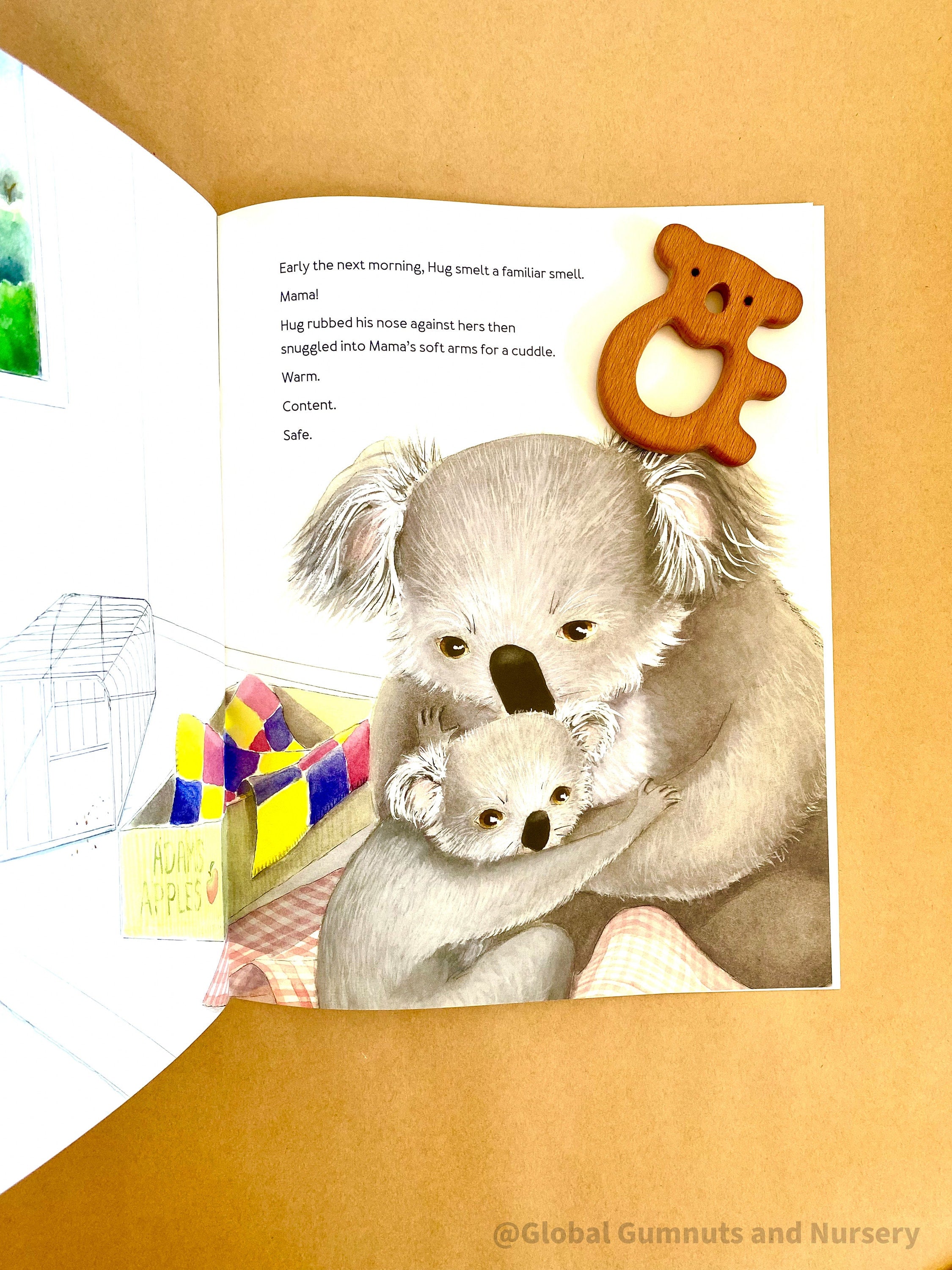 Mama and Hug Book & Wooden Koala Piece: Book with a wooden koala, exploring Australian wildlife connections.
