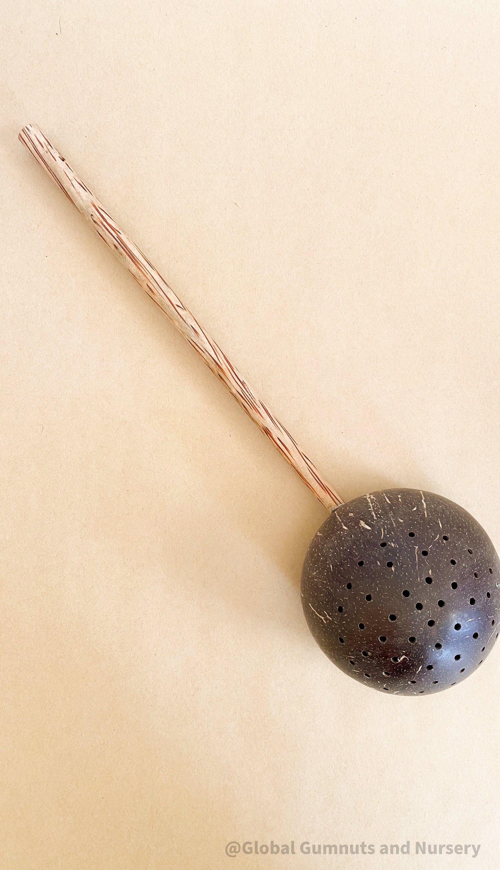 Short handle sand or water scoop, a kid-friendly tool for mud kitchens or play.
