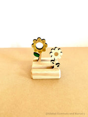 Mini Flower Display with Stand: Floral decor with a stand for small-world scenes and displays.