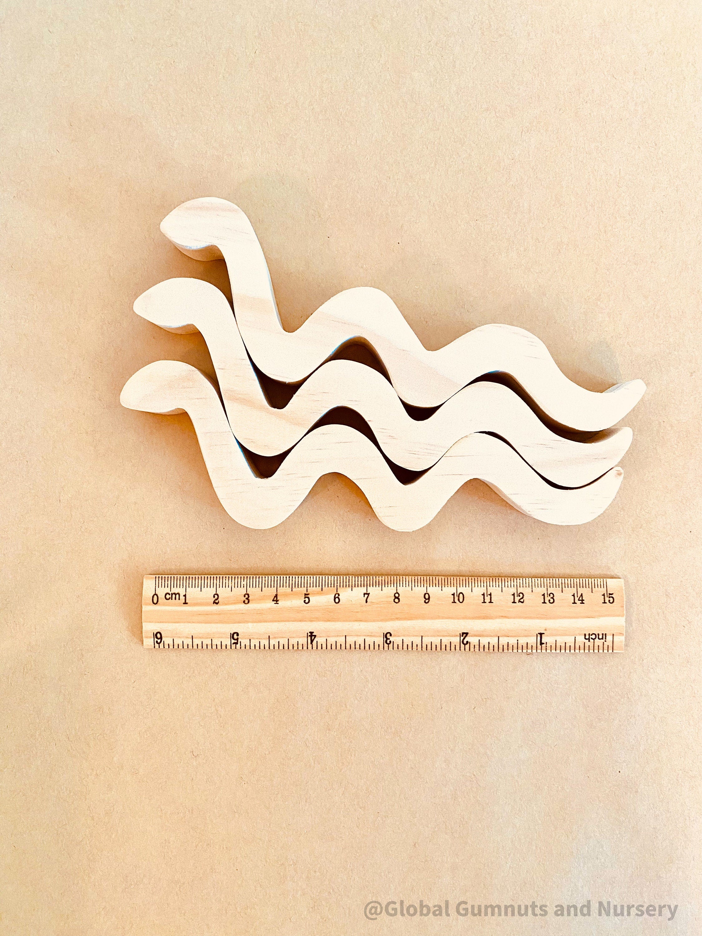 Handmade Raw Pine Wooden Snakes: Wooden snakes crafted from raw pine for creative play.
