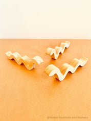 Handmade Raw Pine Wooden Snakes: Wooden snakes crafted from raw pine for creative play.