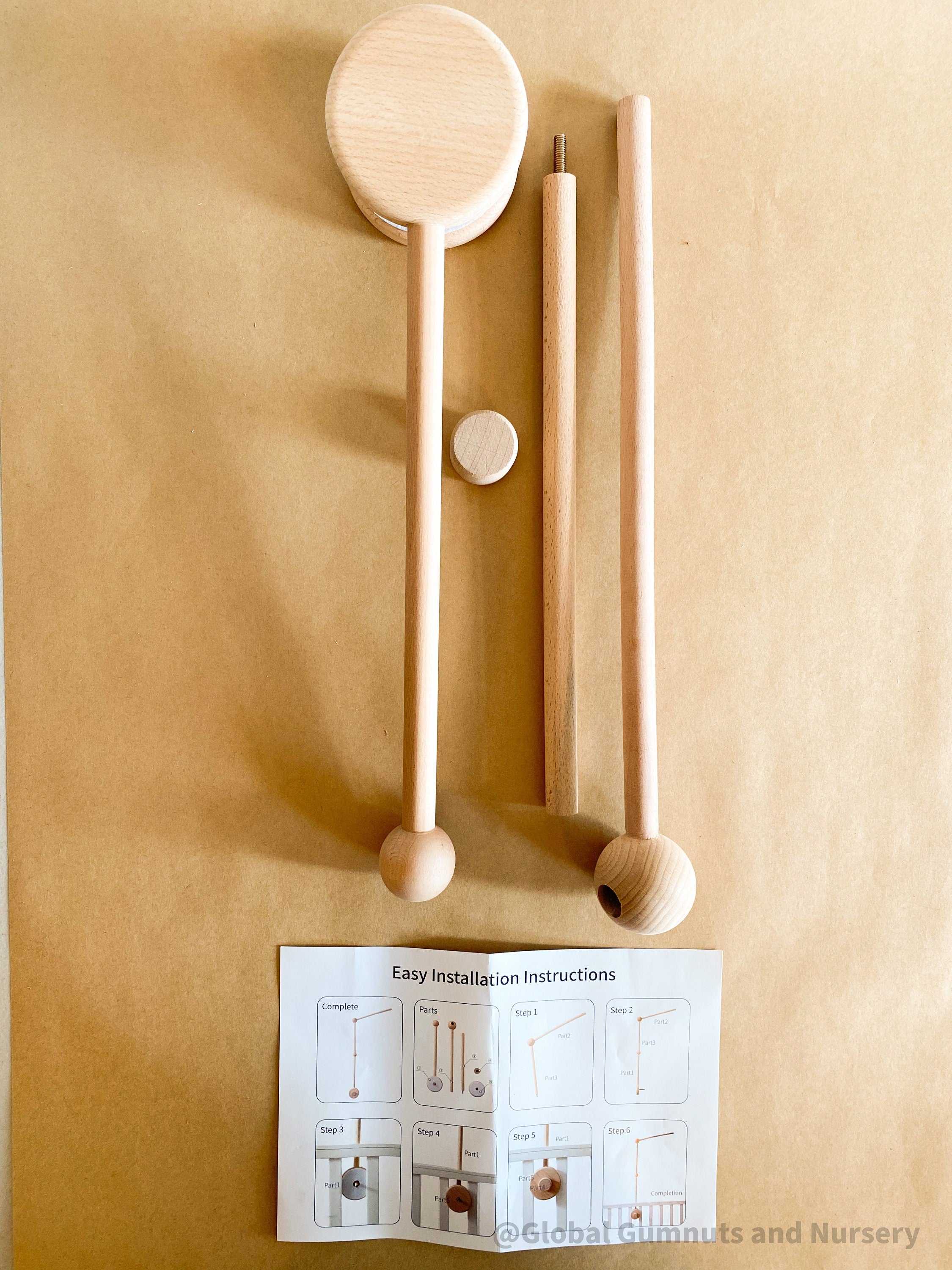 Mobile Arms Nursery Attachment: Wooden mobile hanger arms for cribs or nursery displays, designed to hang decorative items securely.