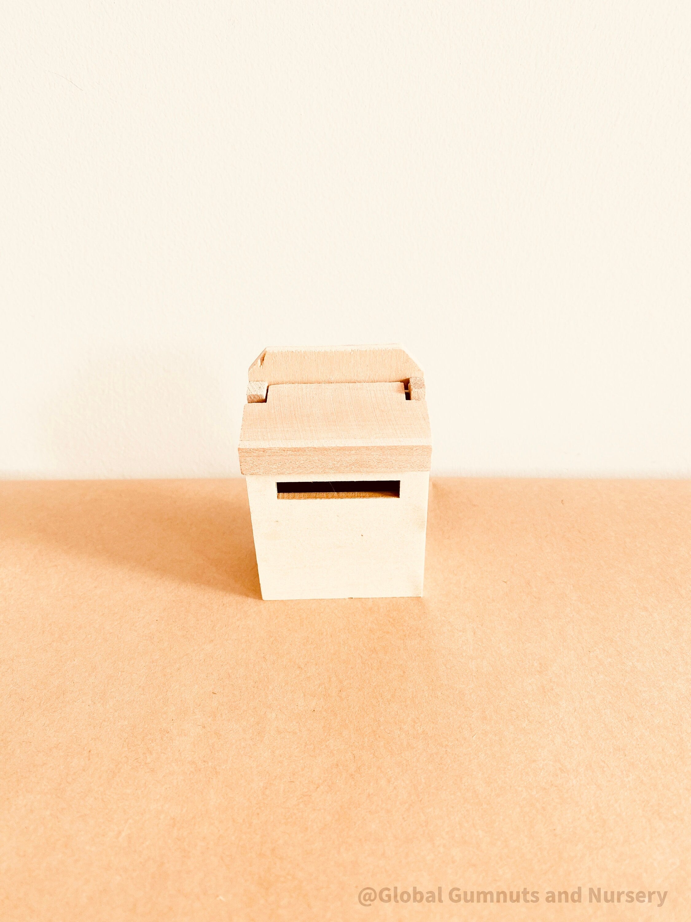 Mail Box – Wooden Fairy Garden: Tiny wooden mailbox for fairy gardens or dollhouses, enhancing imaginative play and whimsical setups.