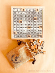 Wooden number board featuring numbers 1-100, perfect for teaching counting, times tables, and number recognition. A fun Montessori-style educational tool for kids.