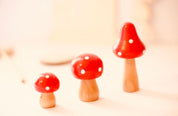 Fairy garden wooden mushrooms, handcrafted for magical small-world setups or Christmas elf displays.

