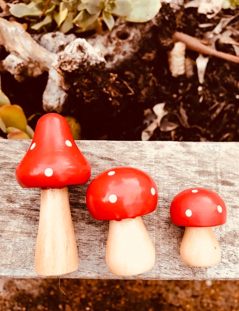 Fairy garden wooden mushrooms, handcrafted for magical small-world setups or Christmas elf displays.
