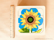 Sunflower life cycle puzzle, Montessori-style educational tool.