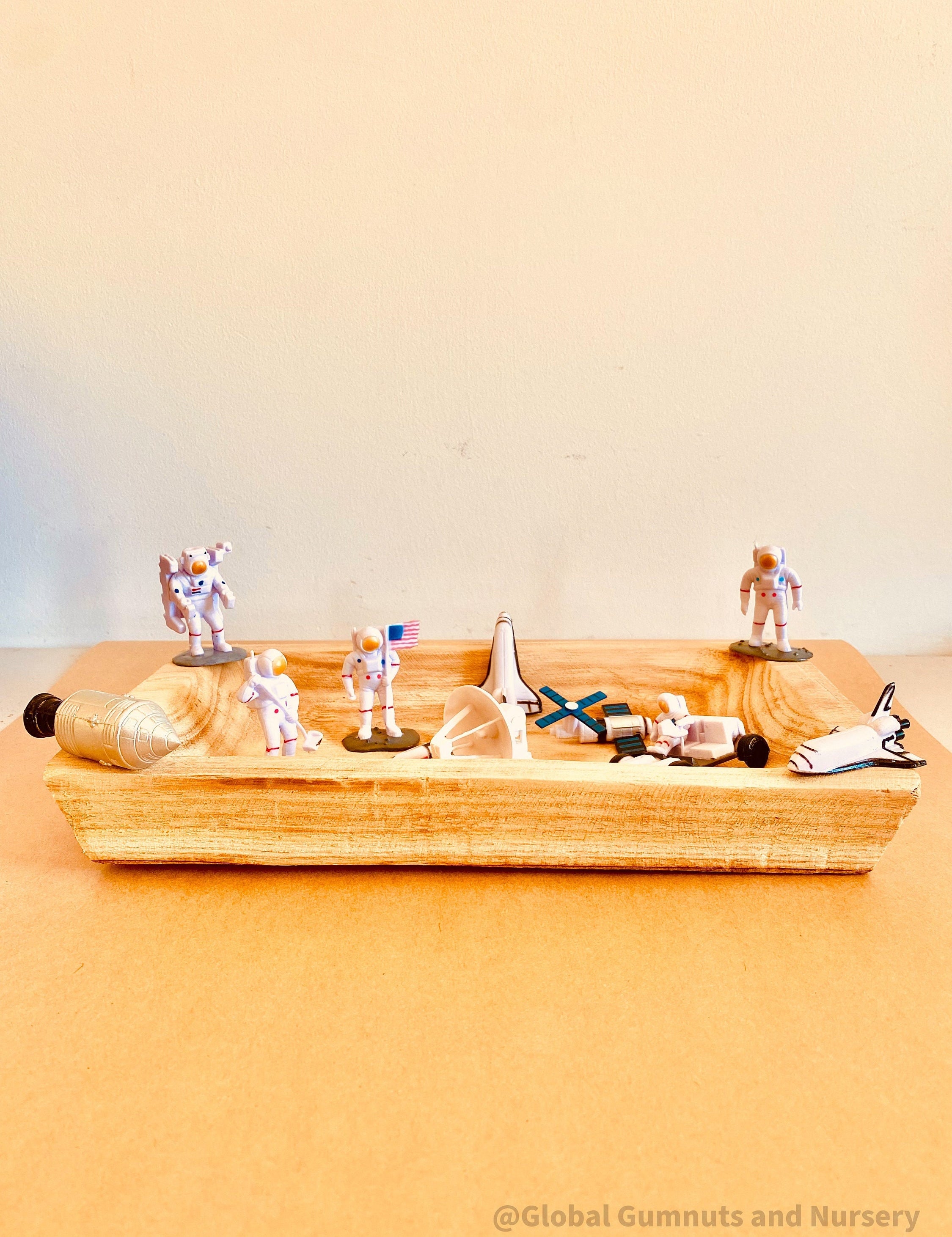 11-piece plastic space explorer figurine set with astronauts, rockets, and space vehicles. Inspires imaginative play and learning about the cosmos!