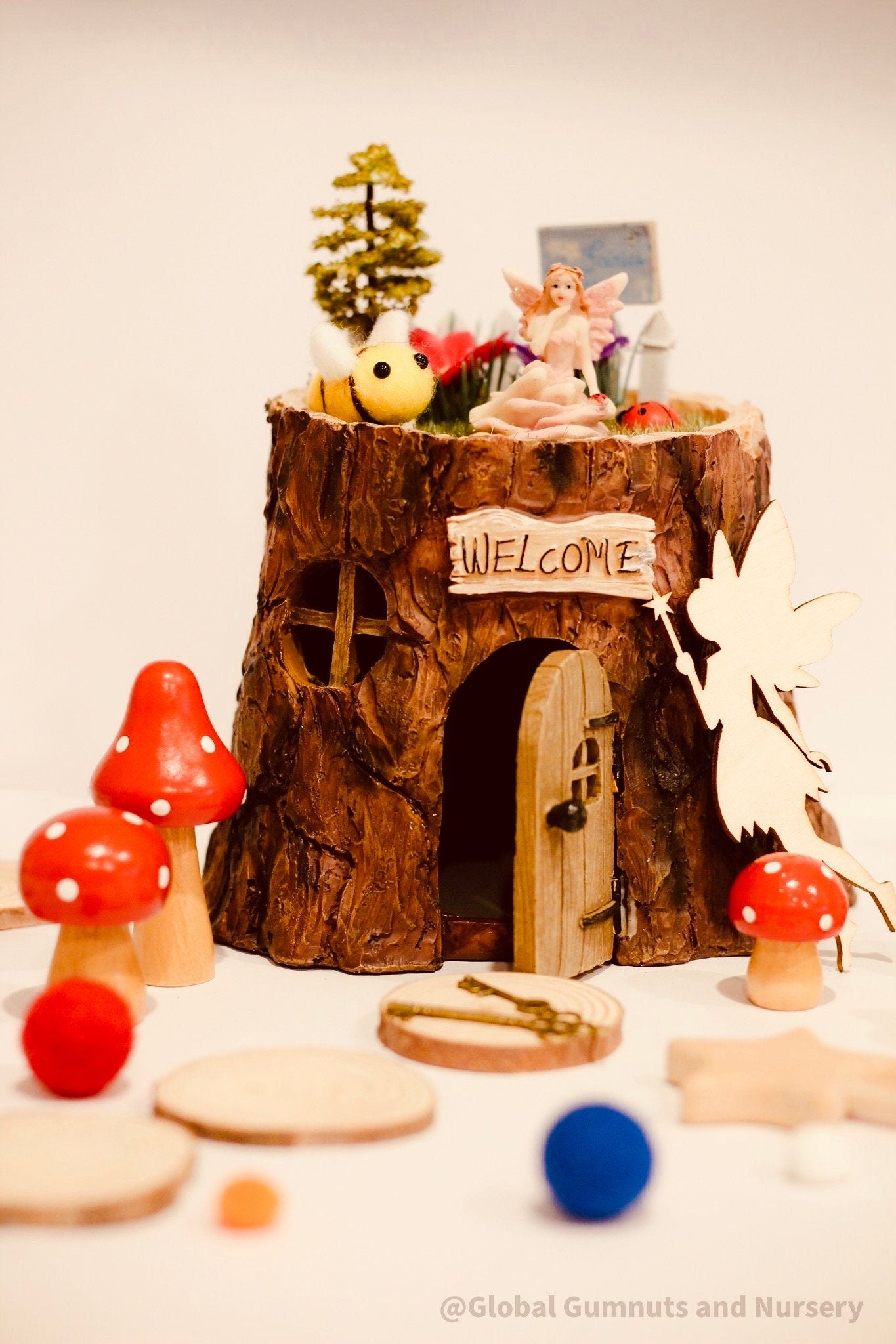 Fairy garden wooden mushrooms, handcrafted for magical small-world setups or Christmas elf displays.