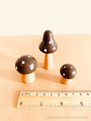 Fairy garden wooden mushrooms, handcrafted for magical small-world setups or Christmas elf displays.