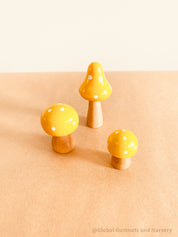 Fairy garden wooden mushrooms, handcrafted for magical small-world setups or Christmas elf displays.