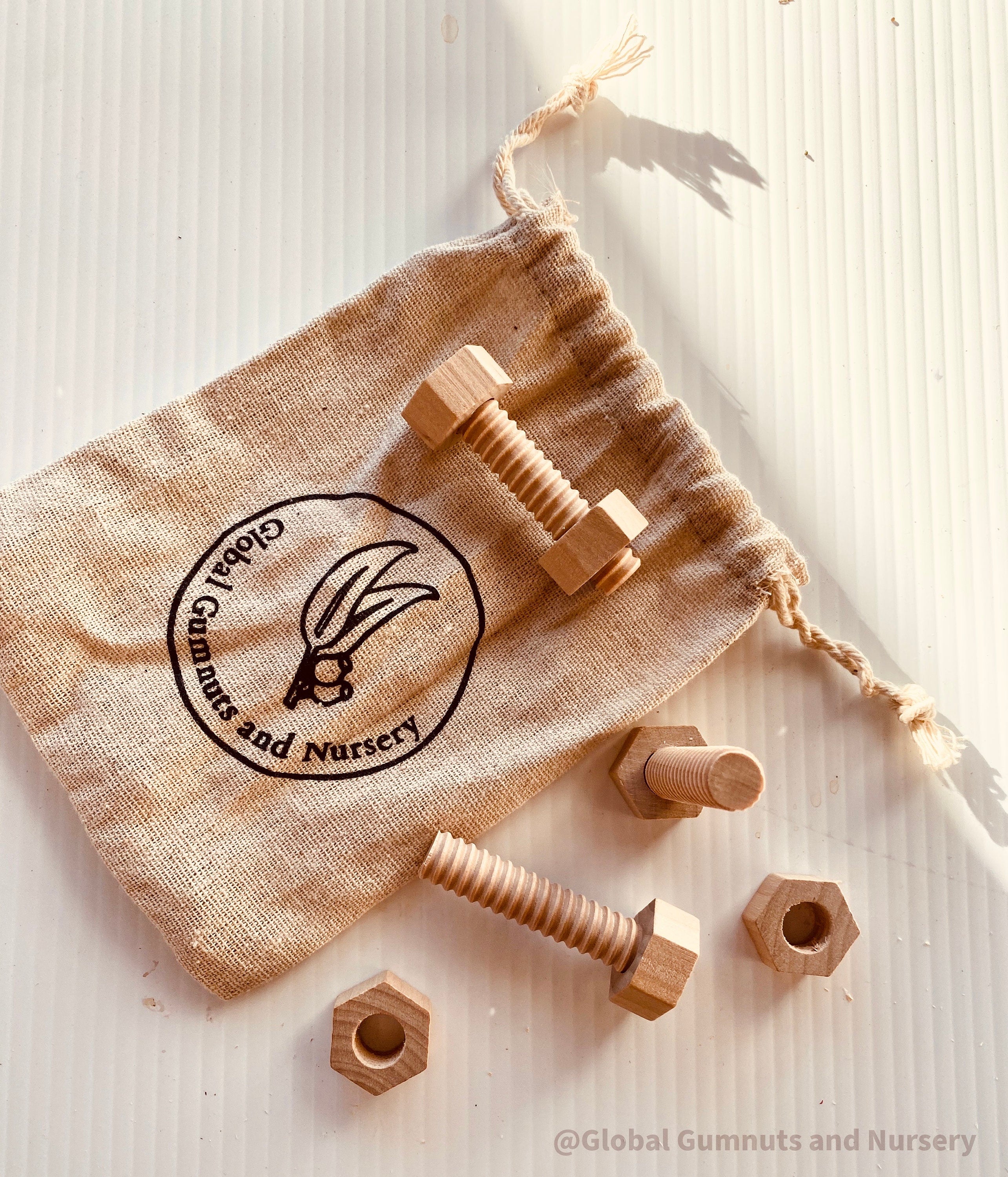 Wooden Nuts & Bolts Set: Six-piece set for motor skill development through play.