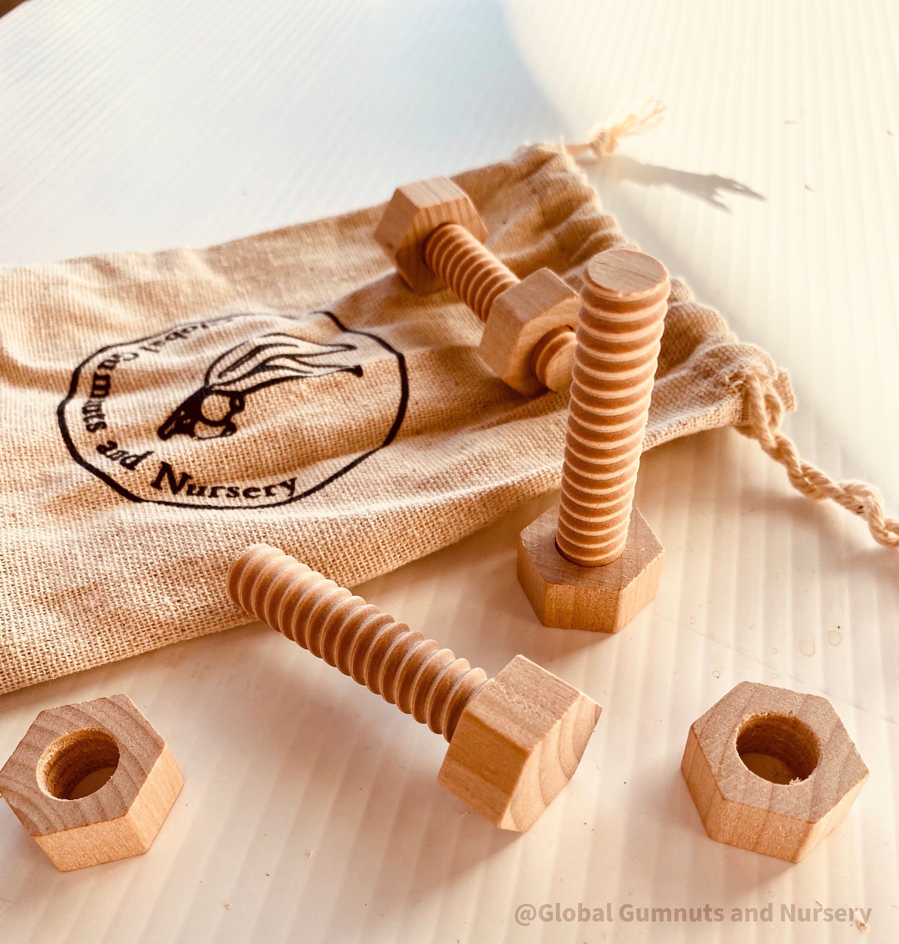 Wooden Nuts & Bolts Set: Six-piece set for motor skill development through play.