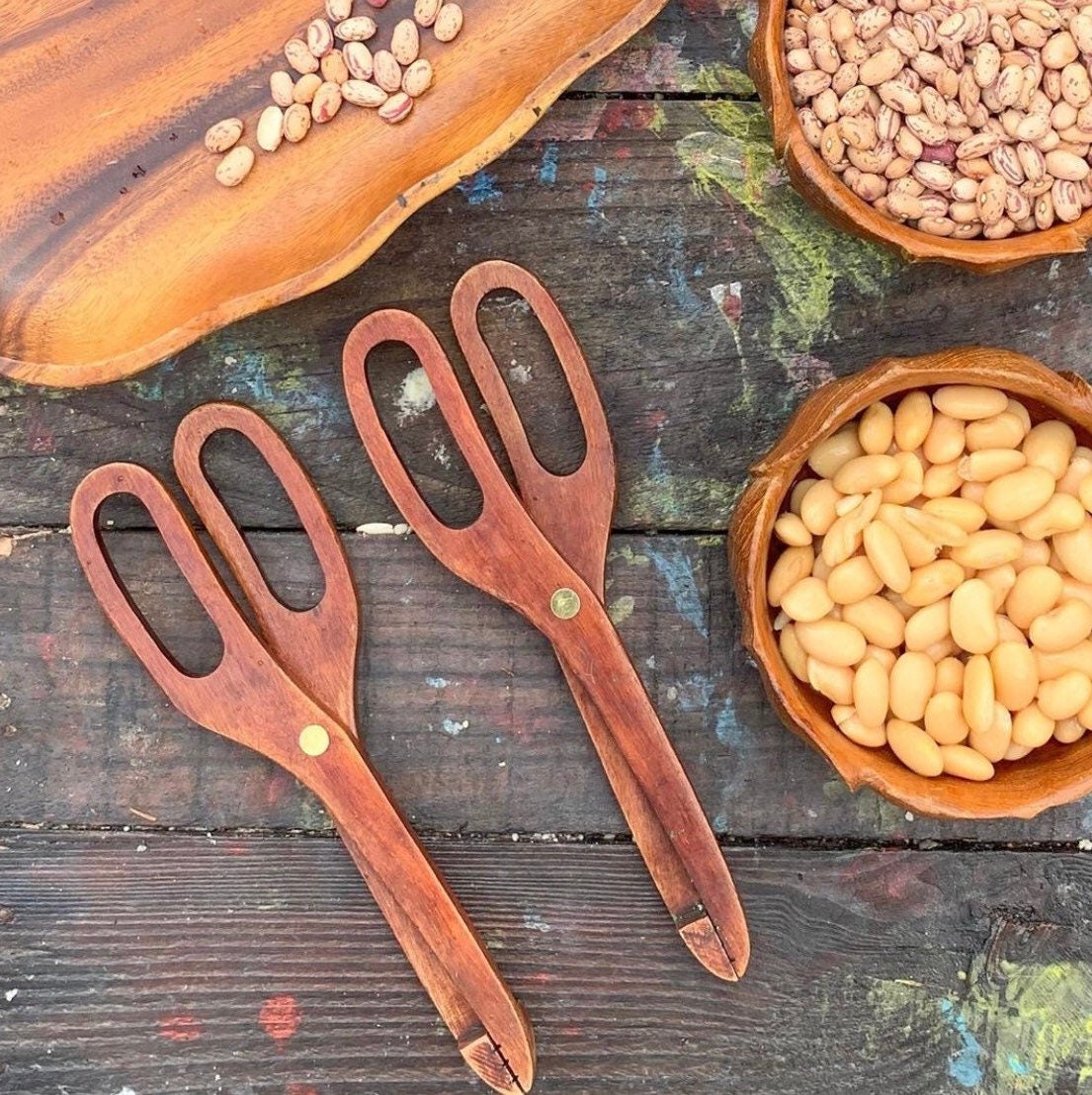 Wooden Scissor Tongs: Play tongs for motor skill development and pretend kitchen play.