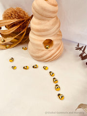 Mini Wooden Bees: Small wooden bee figurines for creative play.