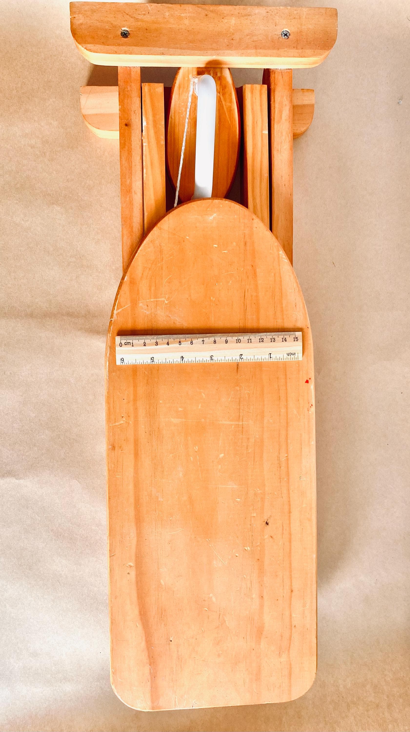 Montessori-inspired vintage pine wood collapsible ironing board and iron set, perfect for role play.