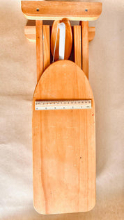 Montessori-inspired vintage pine wood collapsible ironing board and iron set, perfect for role play.