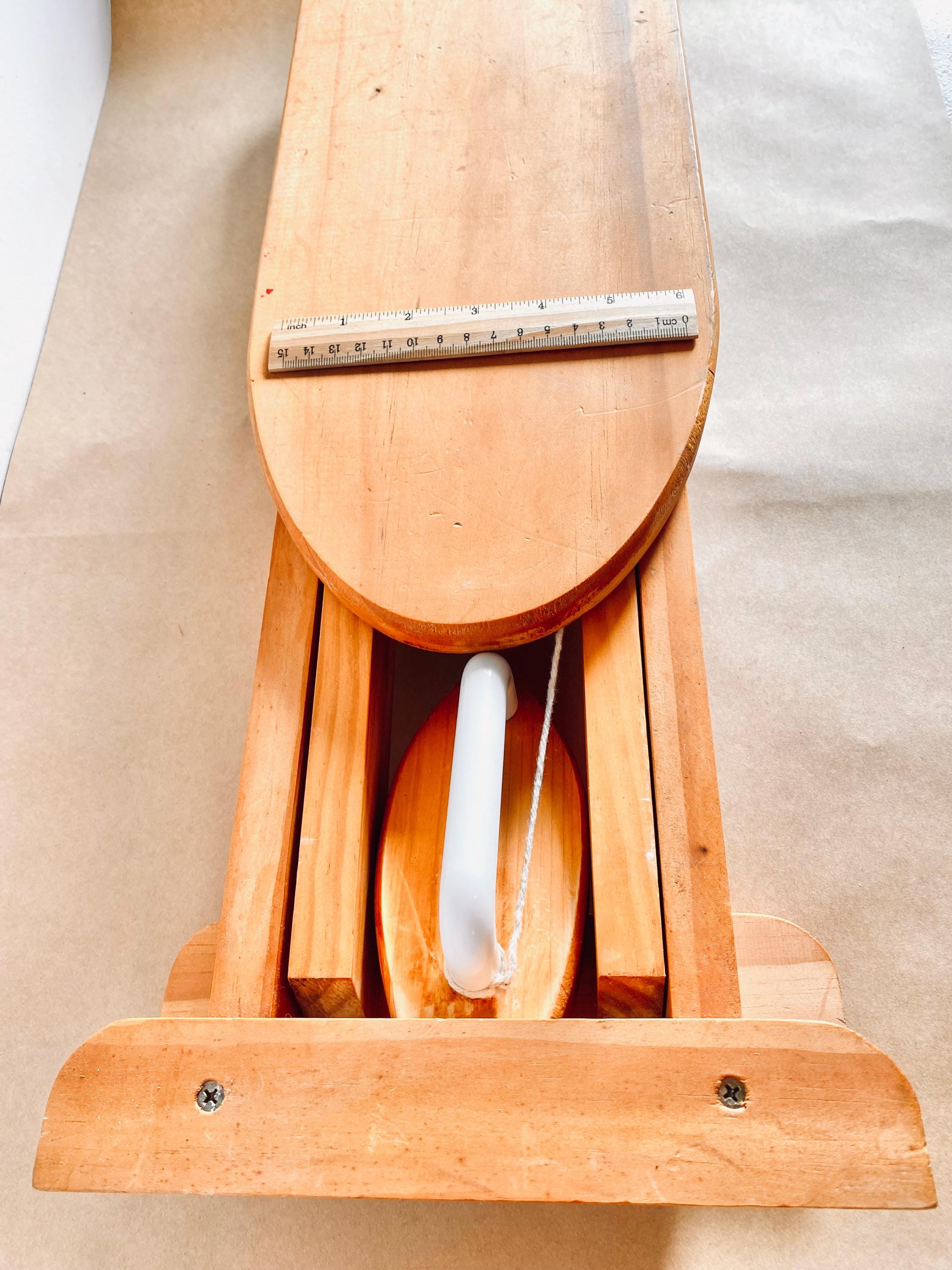 Montessori-inspired vintage pine wood collapsible ironing board and iron set, perfect for role play.