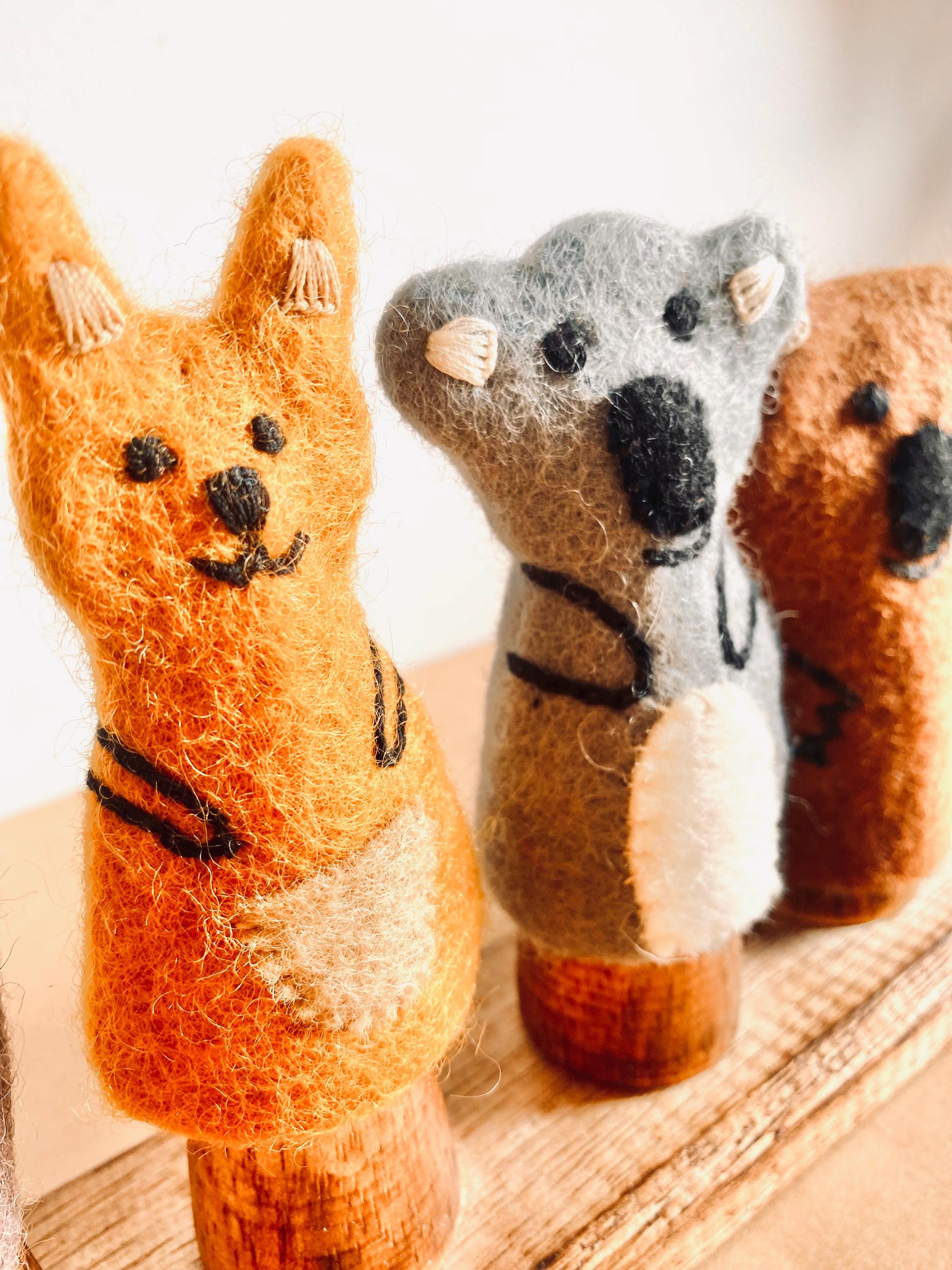 Set of 4 wool felt Australian animal finger puppets, ideal for imaginative play and storytelling. Includes a koala, kangaroo, and more!