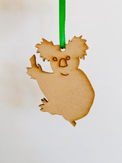 Koala Christmas Ornament: Wooden koala ornament for festive Australian-themed decor.