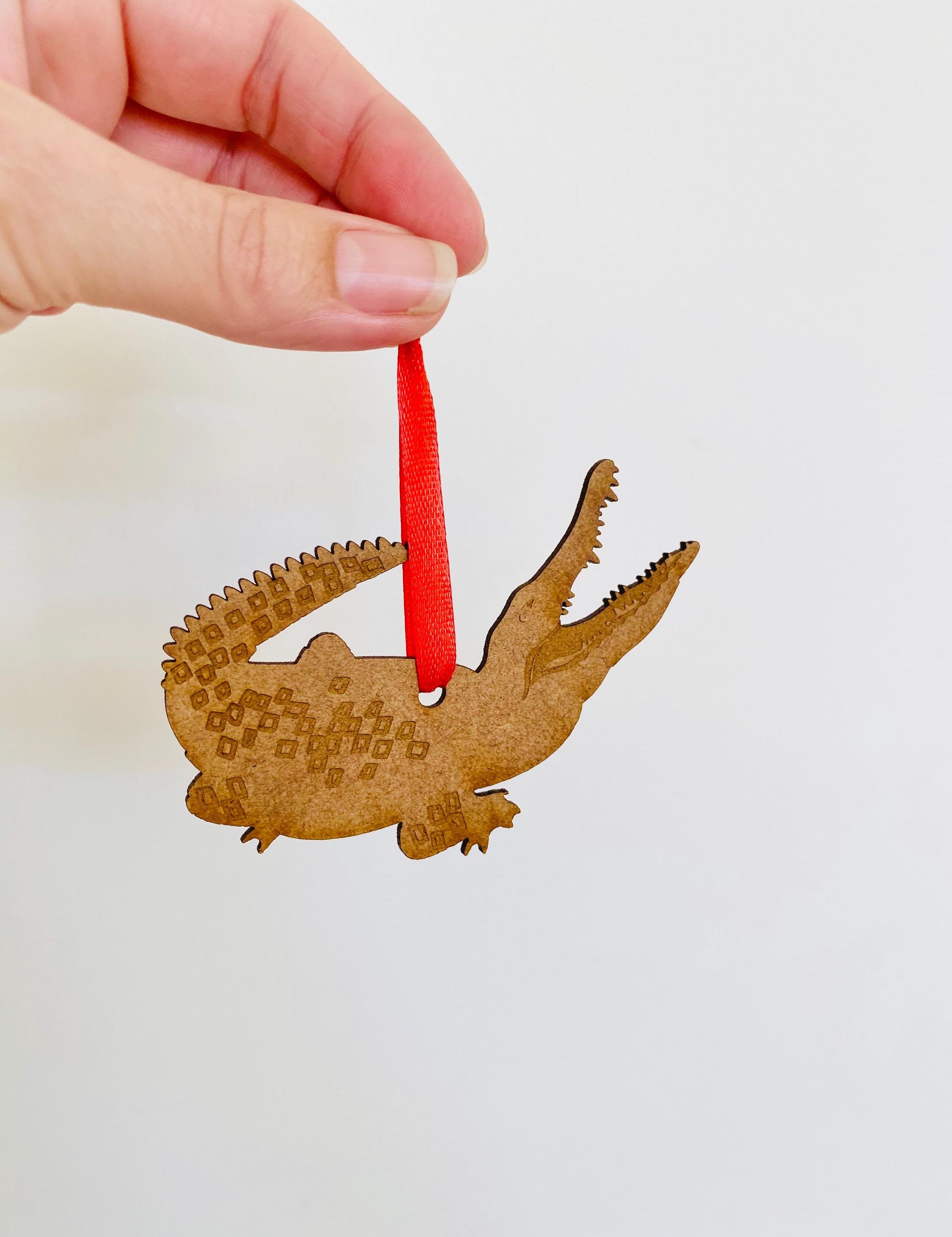 grumpy crocodile ornament: crocodile ornament for australian-themed holiday decor.