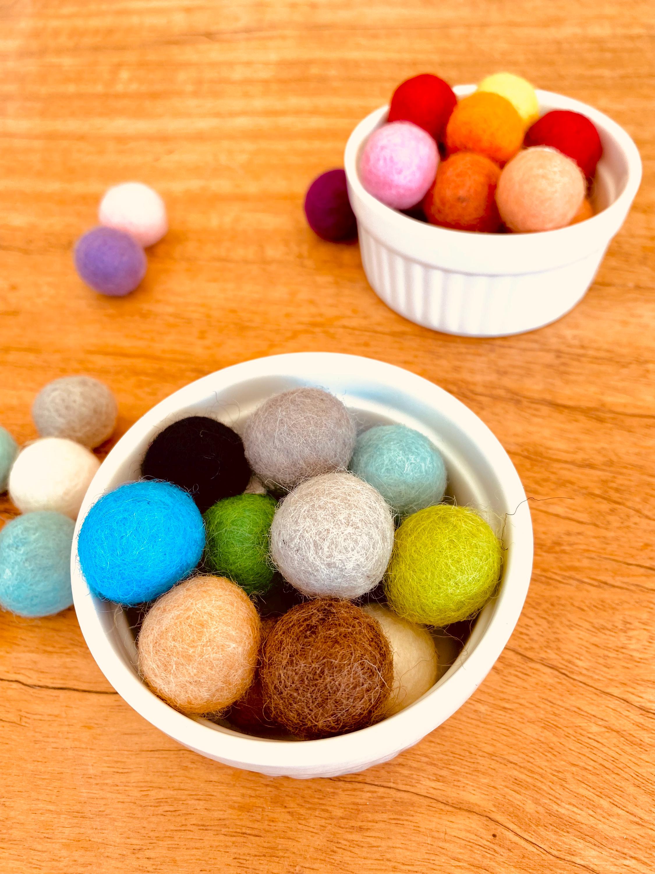 Pure Wool Felt Balls: Soft felt balls in mixed colours for creative play and crafting.