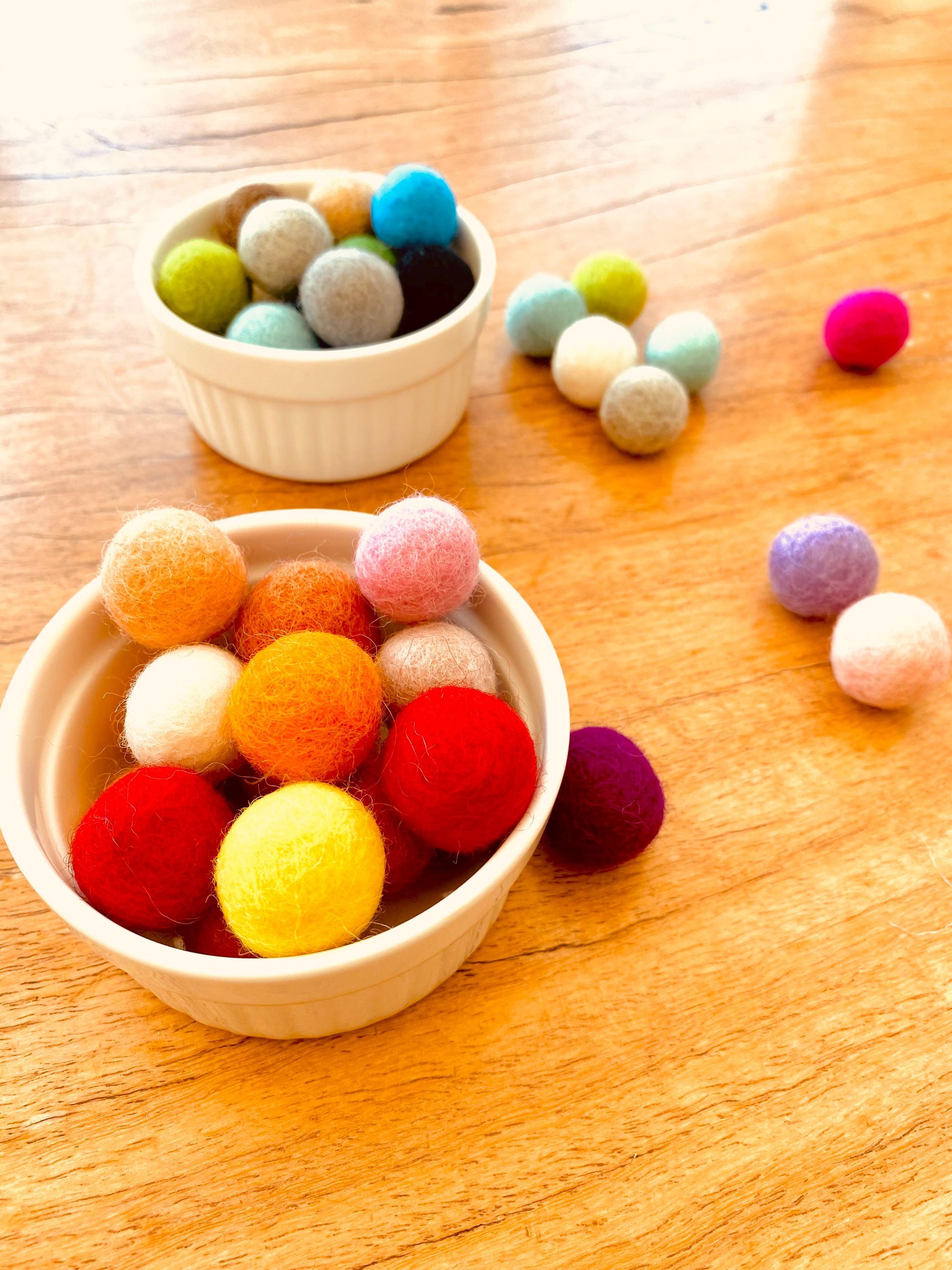 Pure Wool Felt Balls: Soft felt balls in mixed colours for creative play and crafting.