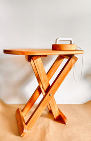 Montessori-inspired vintage pine wood collapsible ironing board and iron set, perfect for role play.

