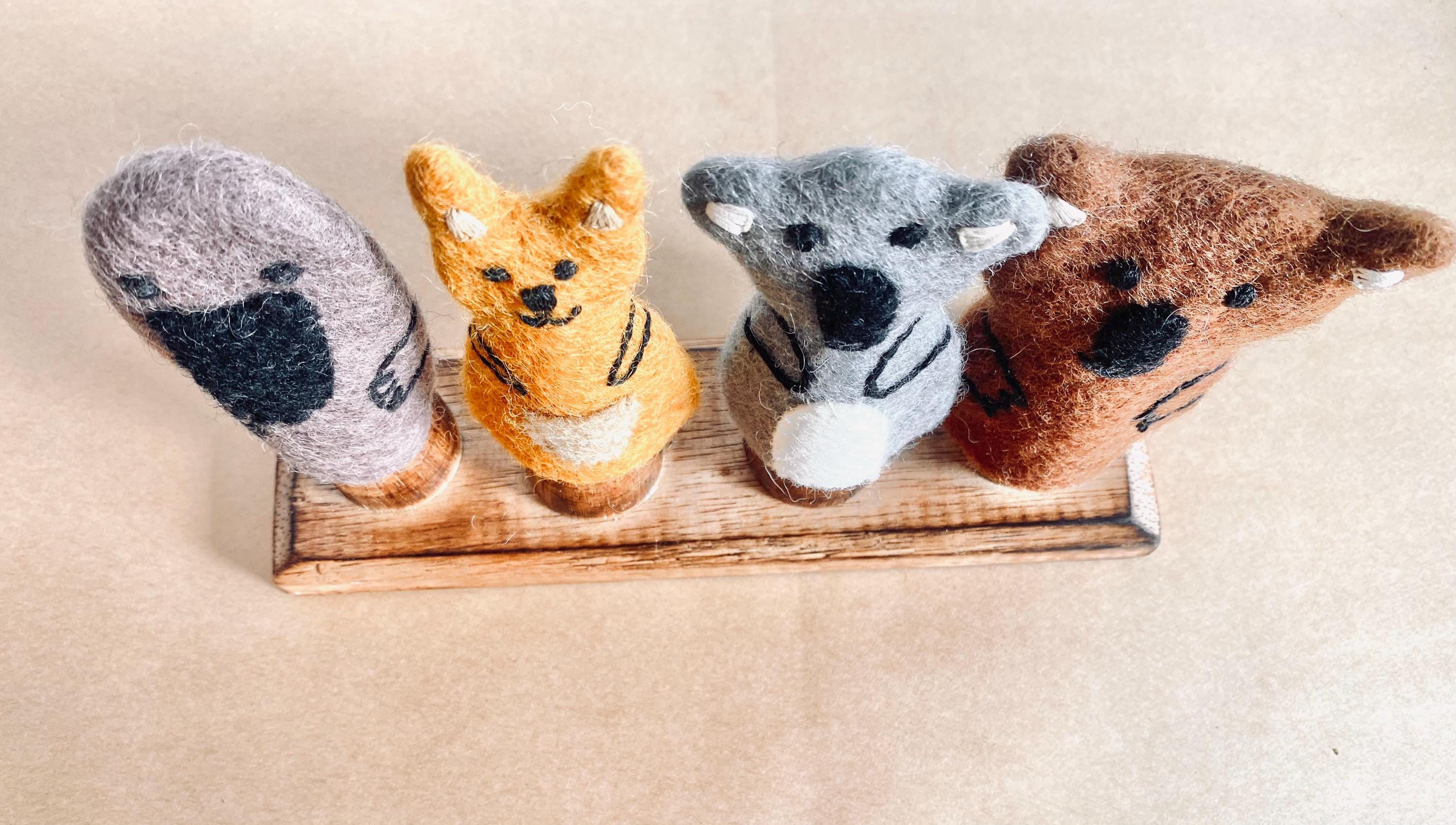Set of 4 wool felt Australian animal finger puppets, ideal for imaginative play and storytelling. Includes a koala, kangaroo, and more!