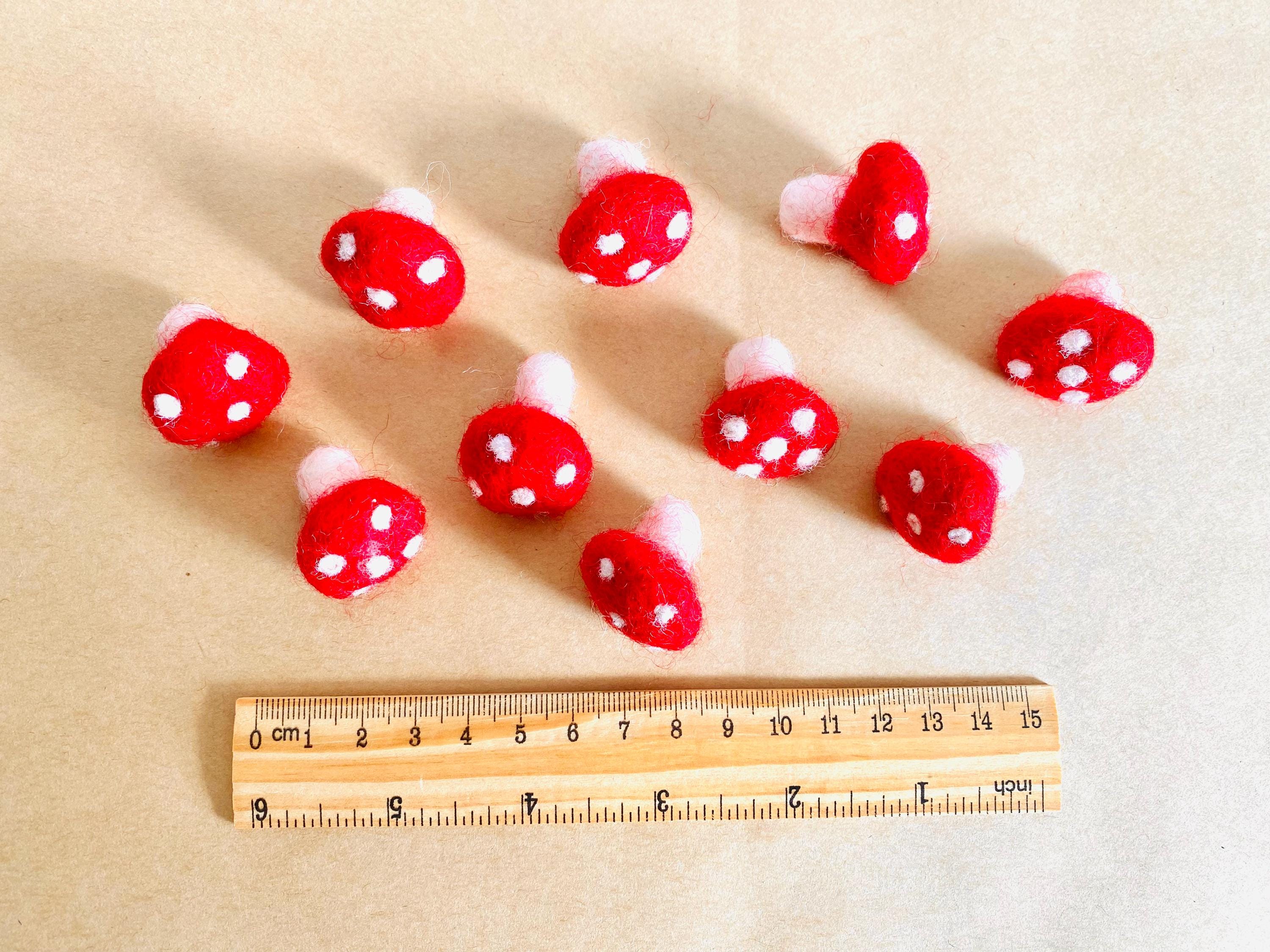 Felt Mushrooms: Red and white felt mushrooms for fairy garden play.