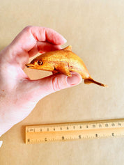 Eco-friendly 11cm wooden dolphin figurine, perfect as sustainable decor or a playful toy.