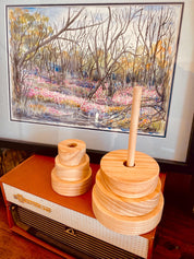Natural Wooden Stacker: Customizable stacker with a personalized name option.