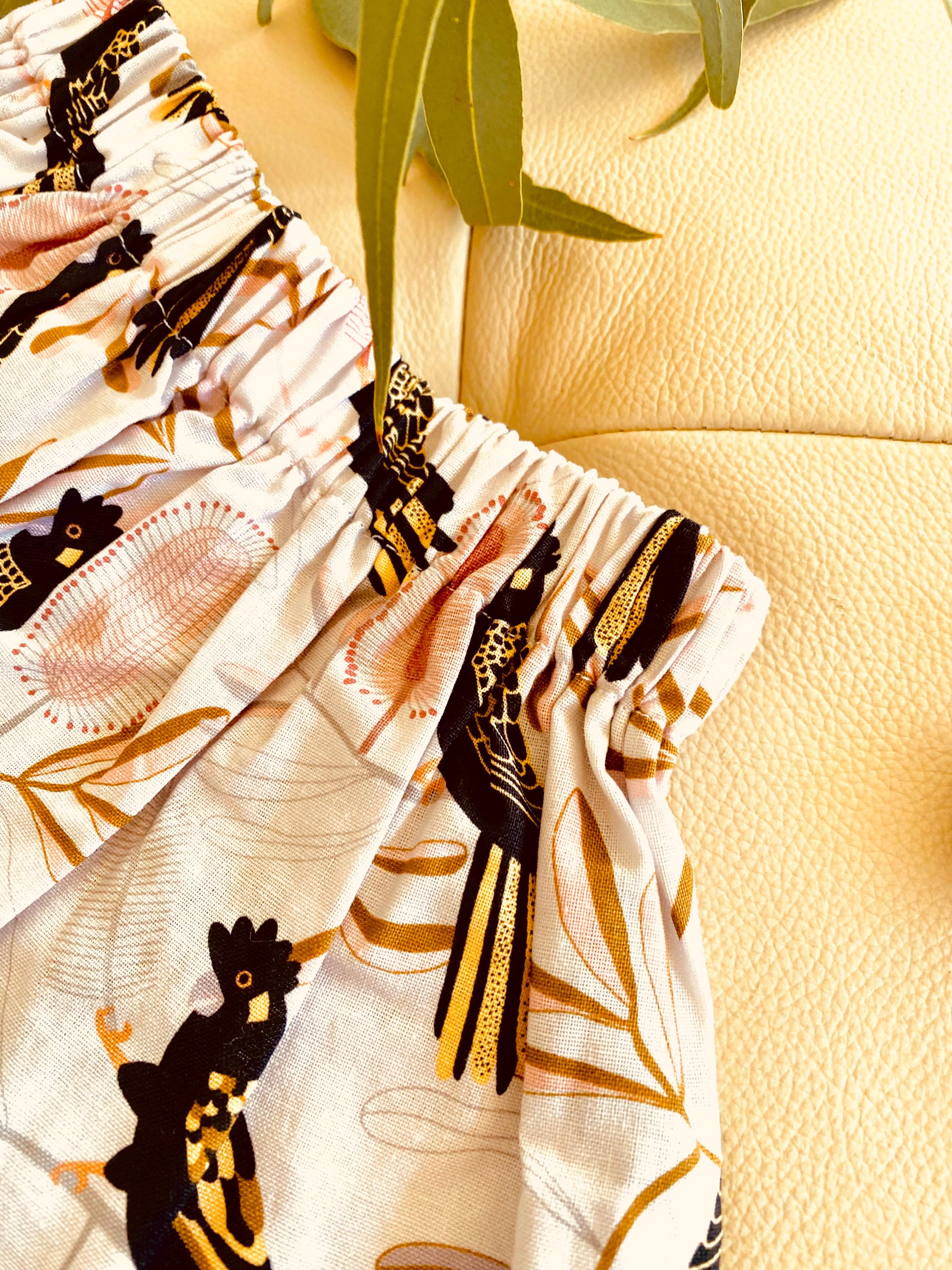 Black Cockatoo Skirt: Australian-themed cotton skirt with a black cockatoo pattern, handmade with a touch of charm.