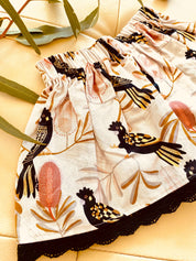 Black Cockatoo Skirt: Australian-themed cotton skirt with a black cockatoo pattern, handmade with a touch of charm.