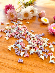 Butterfly bead set in pink, green, purple, and blue. Great for creative jewelry projects and kids' crafts.