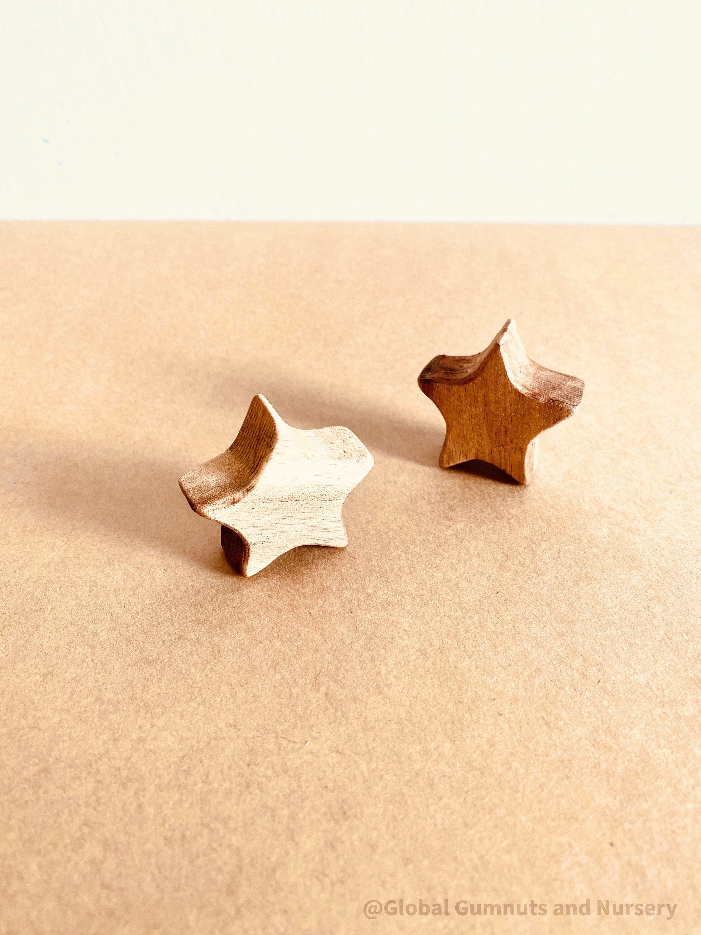 handmade wooden stars: set of two wooden stars, safe for decor or play.