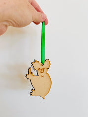 Koala Christmas Ornament: Wooden koala ornament for festive Australian-themed decor.