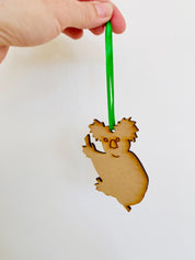 Koala Christmas Ornament: Wooden koala ornament for festive Australian-themed decor.