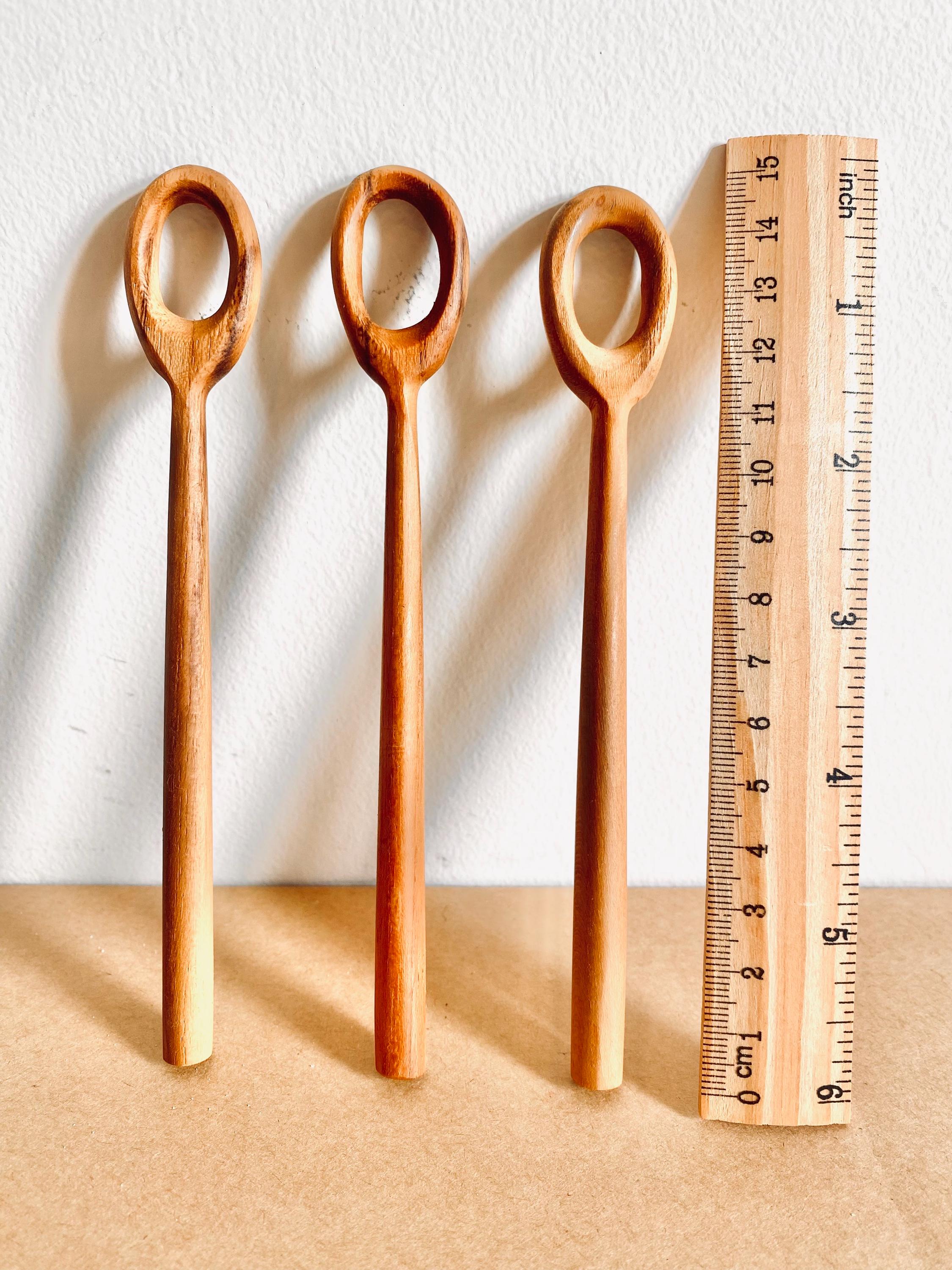 teak bubble wand: wooden wand for bubbles or stirring activities.