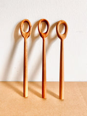 teak bubble wand: wooden wand for bubbles or stirring activities.