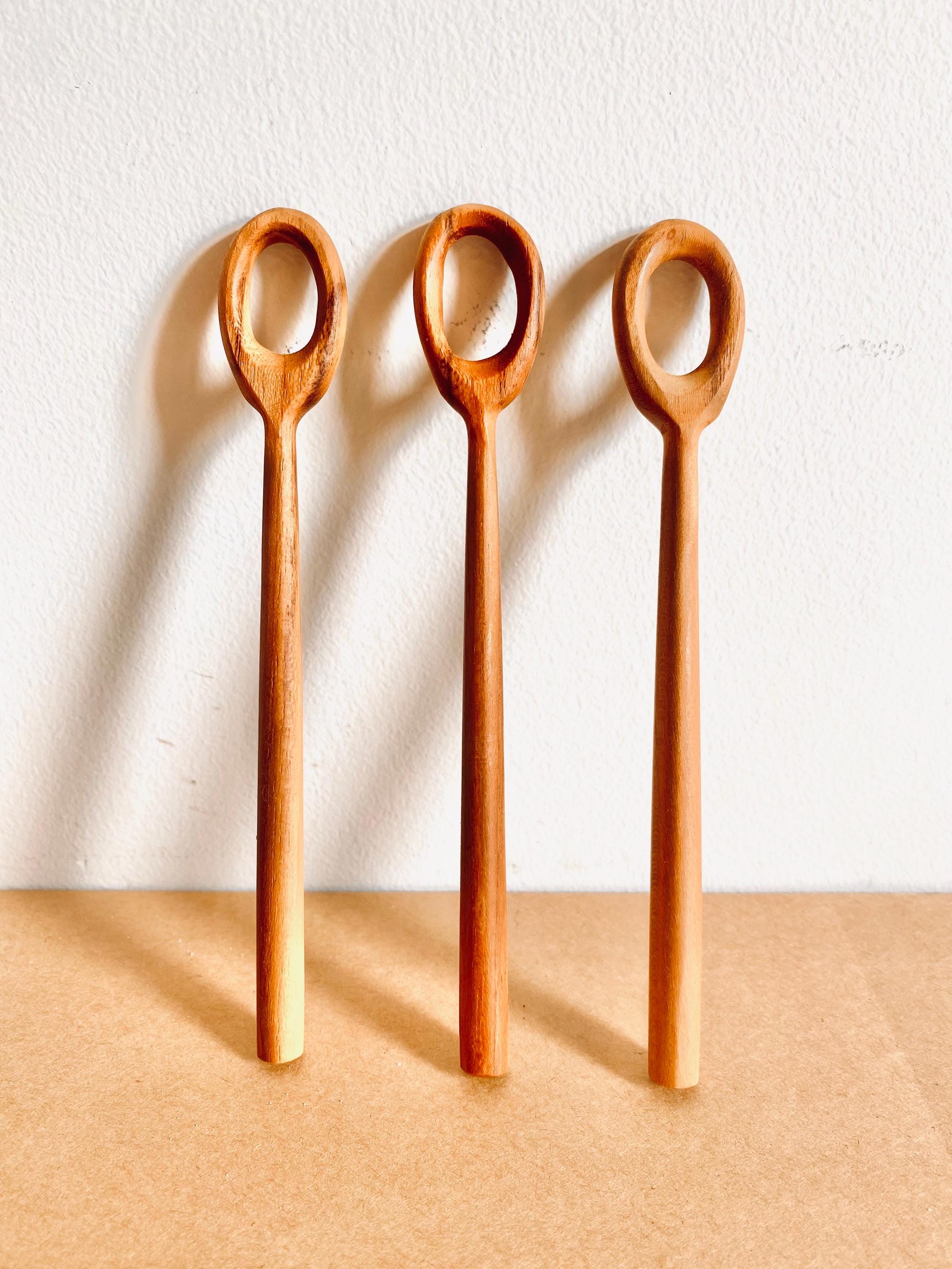 teak bubble wand: wooden wand for bubbles or stirring activities.