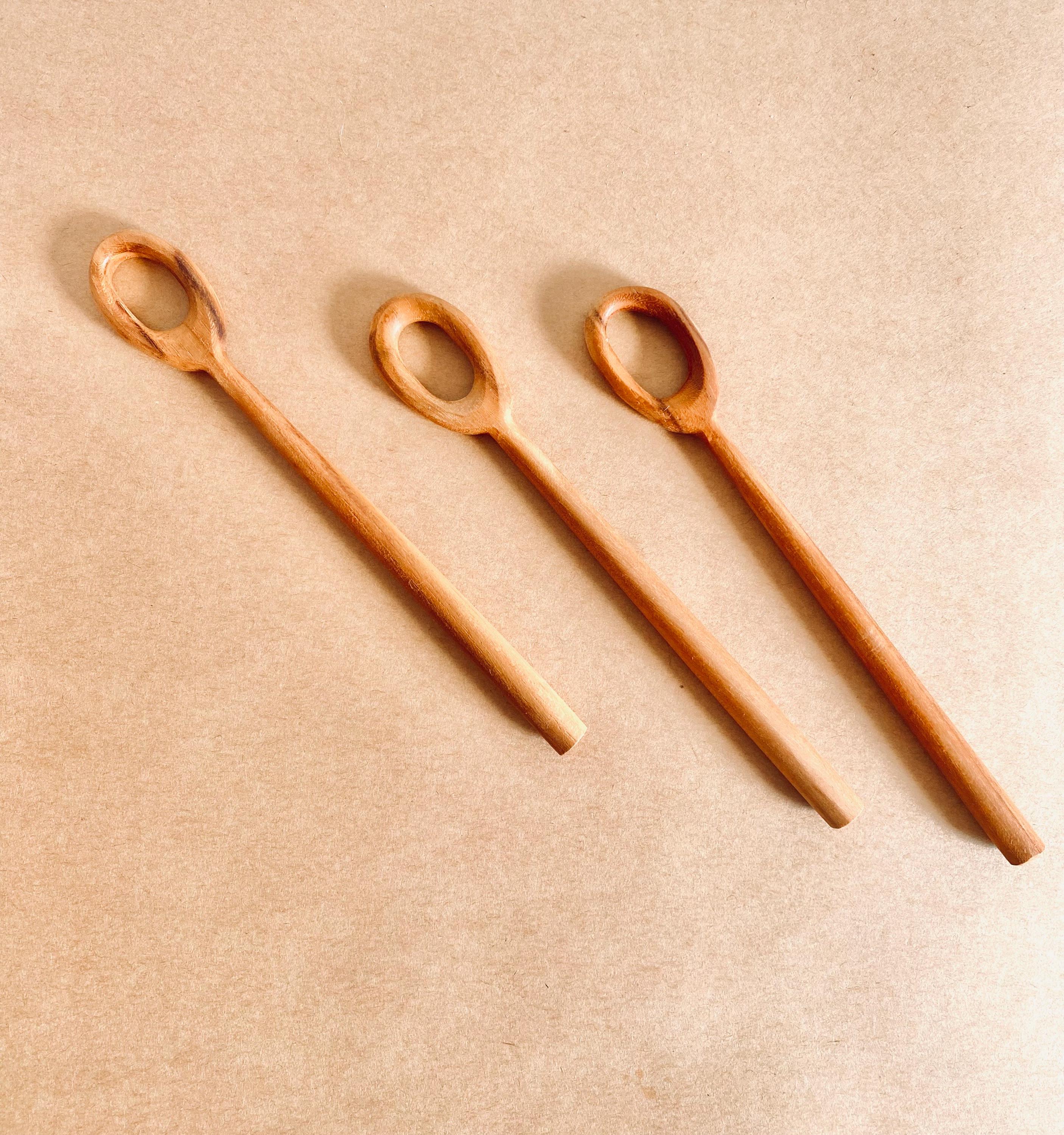 teak bubble wand: wooden wand for bubbles or stirring activities.