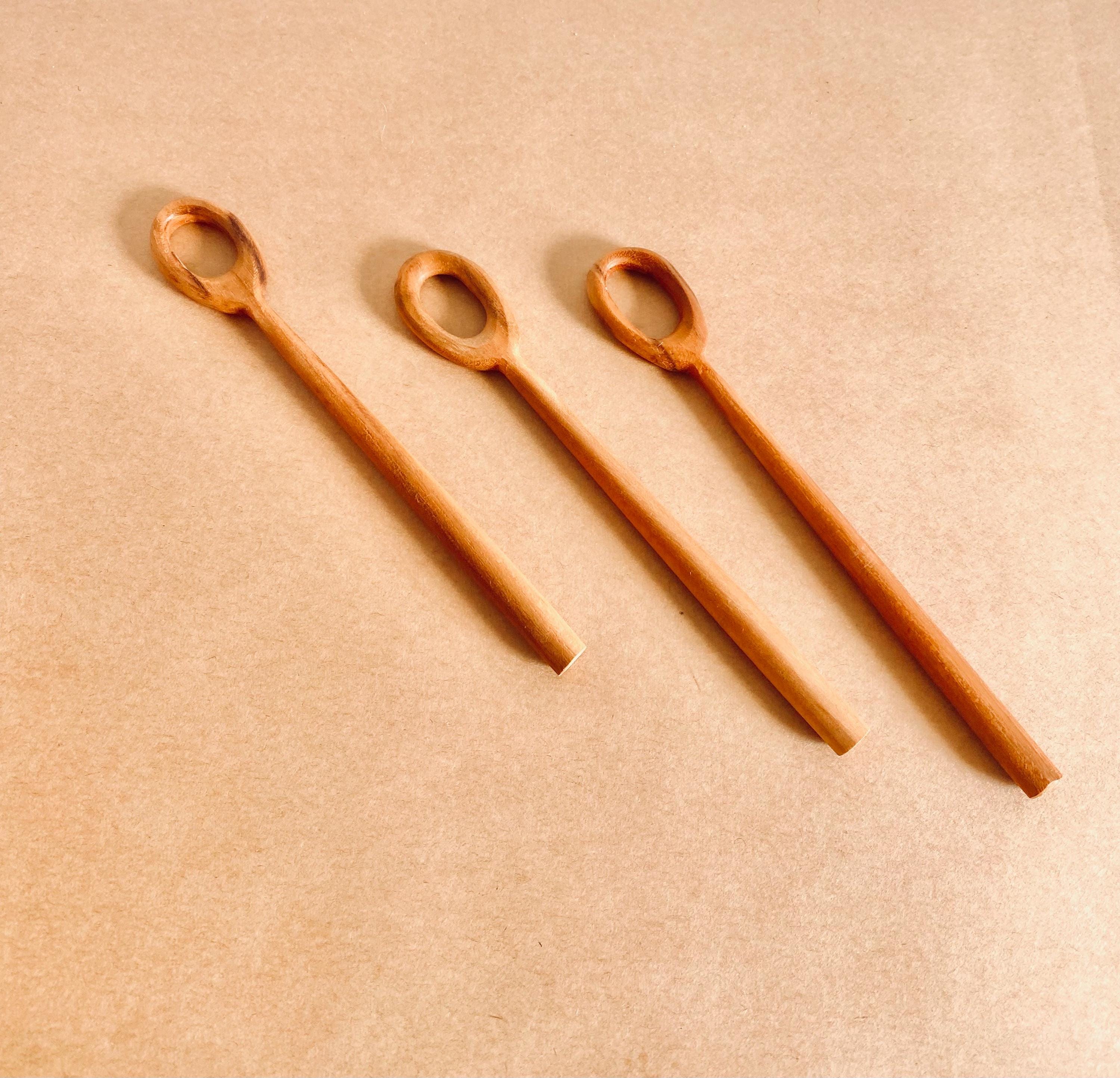 teak bubble wand: wooden wand for bubbles or stirring activities.