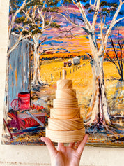 Natural Wooden Stacker: Customizable stacker with a personalized name option.