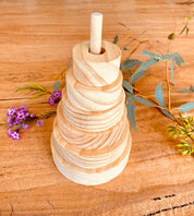 Natural Wooden Stacker: Customizable stacker with a personalized name option.