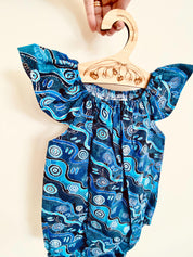 Handmade Desert Tracks Playsuit: Indigenous-inspired cotton playsuit with desert tracks pattern, handmade in Western Australia.
