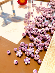 Purple flowers and round beads floral craft bead set, perfect for creative projects.