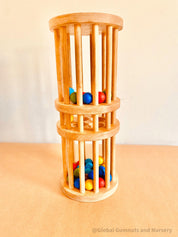 Wooden rainmaker toy in two sizes, a magical sensory and musical toy for kids.